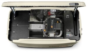 Open standby generator showing internal components and control panel