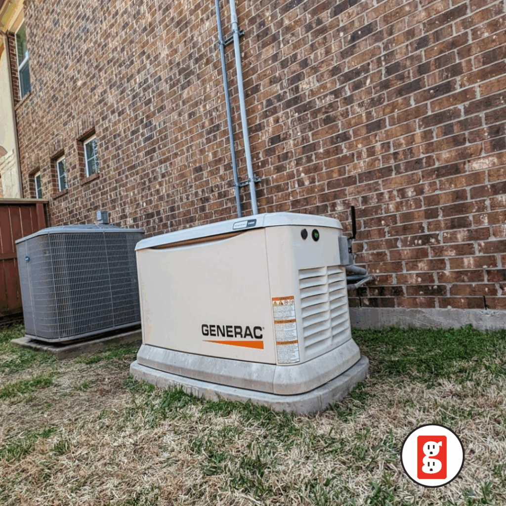 Generac standby generator installed beside a brick home