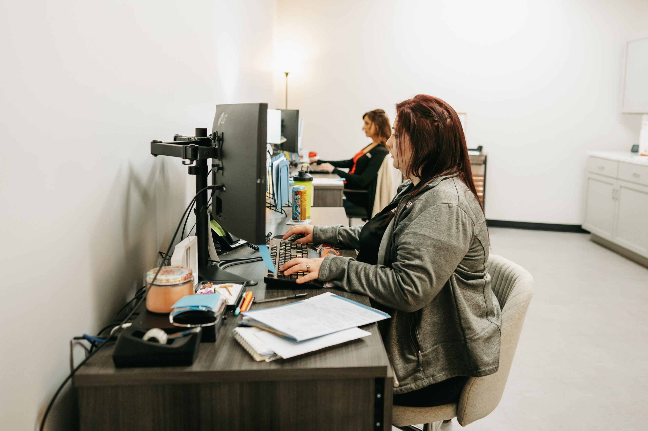 Person using a computer workstation for remote work setup